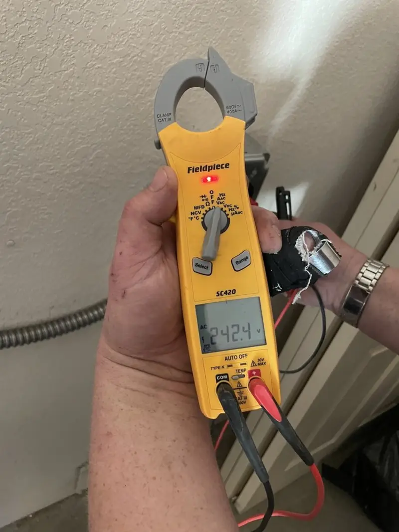 Voltage testing with clamp meter during Ceiling Fan Installation in Mission Hills